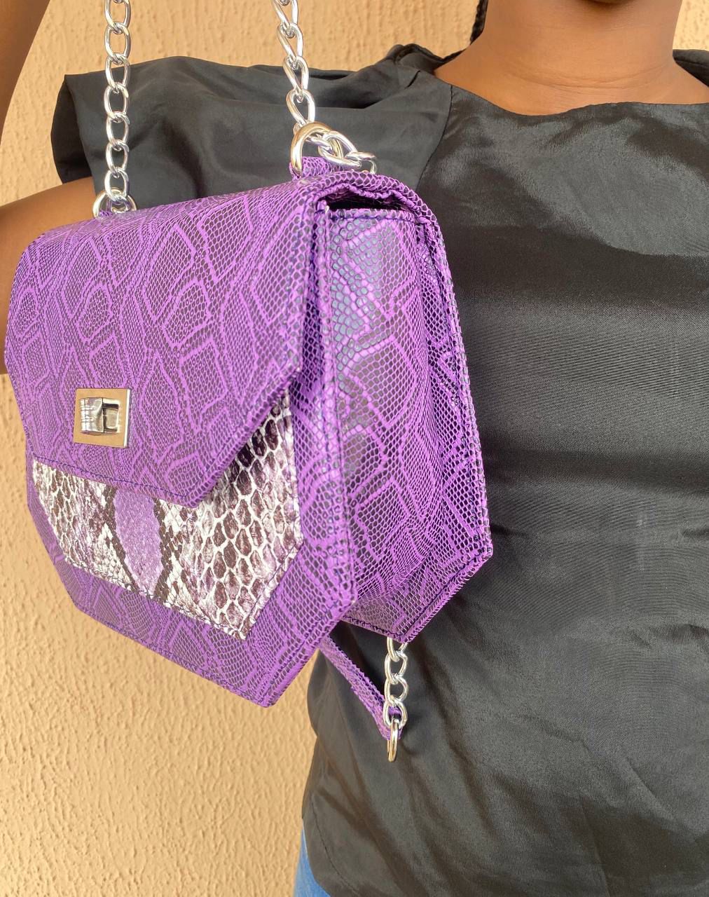 Leather handbag with frame side