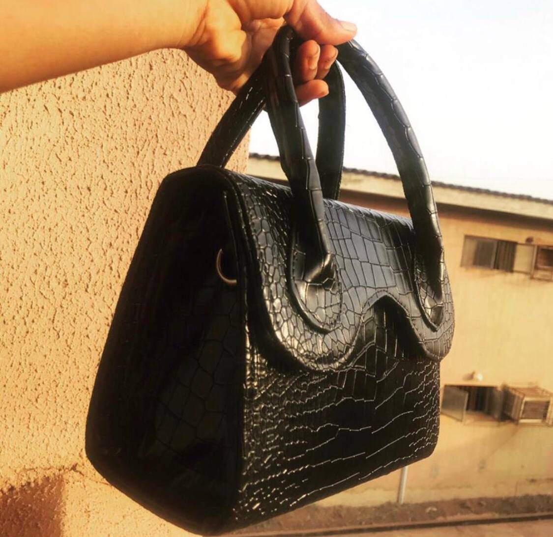 Crocs leather handbag with sew-on handles